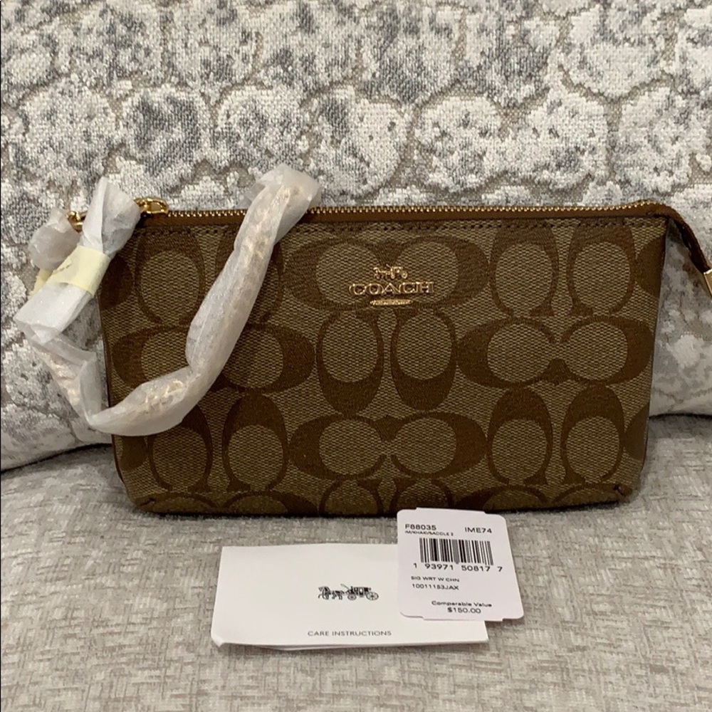 Signature Coach Wristlet
